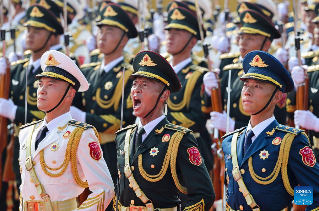 PLA guards of honor formation marches through Tian'anmen Square