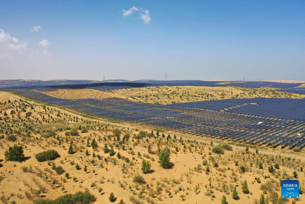 PV projects boost local ecological rehabilitation, economic growth in Kubuqi Desert, China's Inner Mongolia