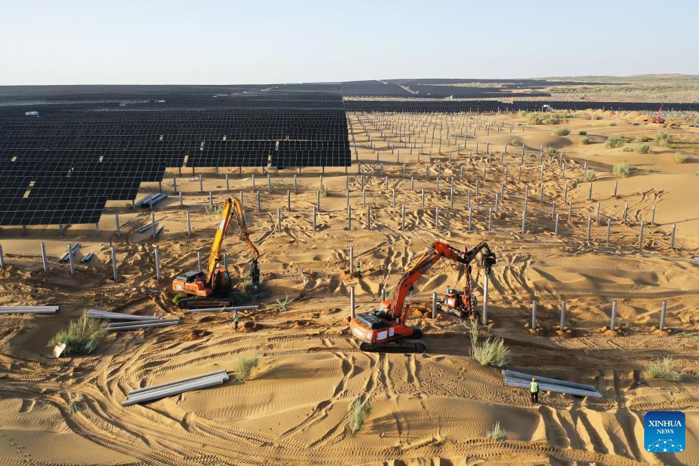 PV projects boost local ecological rehabilitation, economic growth in Kubuqi Desert, China's Inner Mongolia