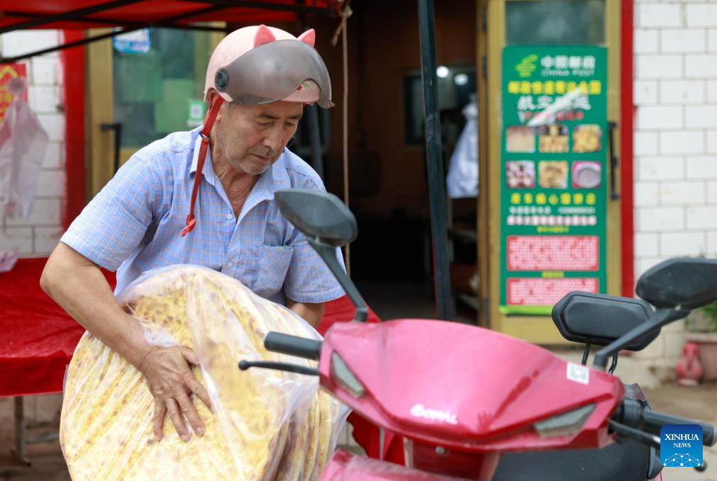 Traditional naan-making techniques inherited, developed in Xinjiang
