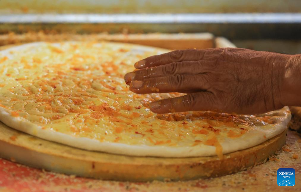Traditional naan-making techniques inherited, developed in Xinjiang