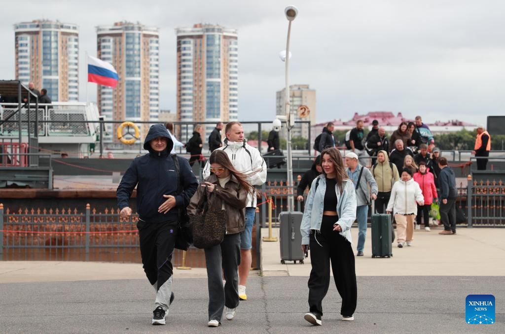 Russian travelers enter China visa-free as new policy takes effect