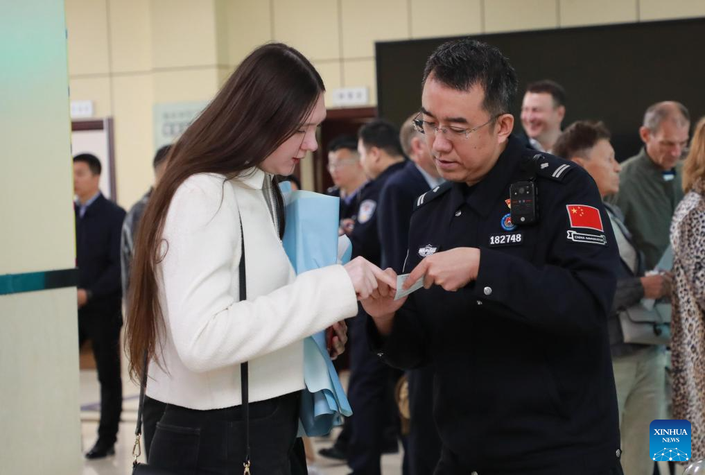 Russian travelers enter China visa-free as new policy takes effect