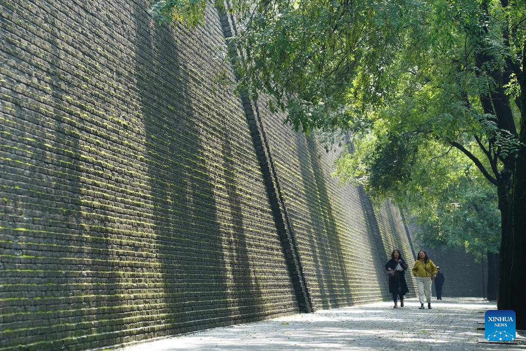 City wall covered with green coat attracts visitors in Xi'an, NW China