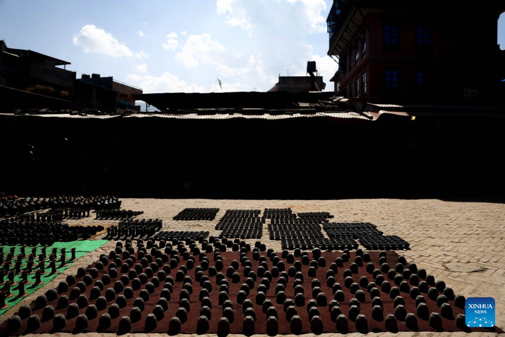 Workers make clay pots for Tihar festival in Bhaktapur, Nepal