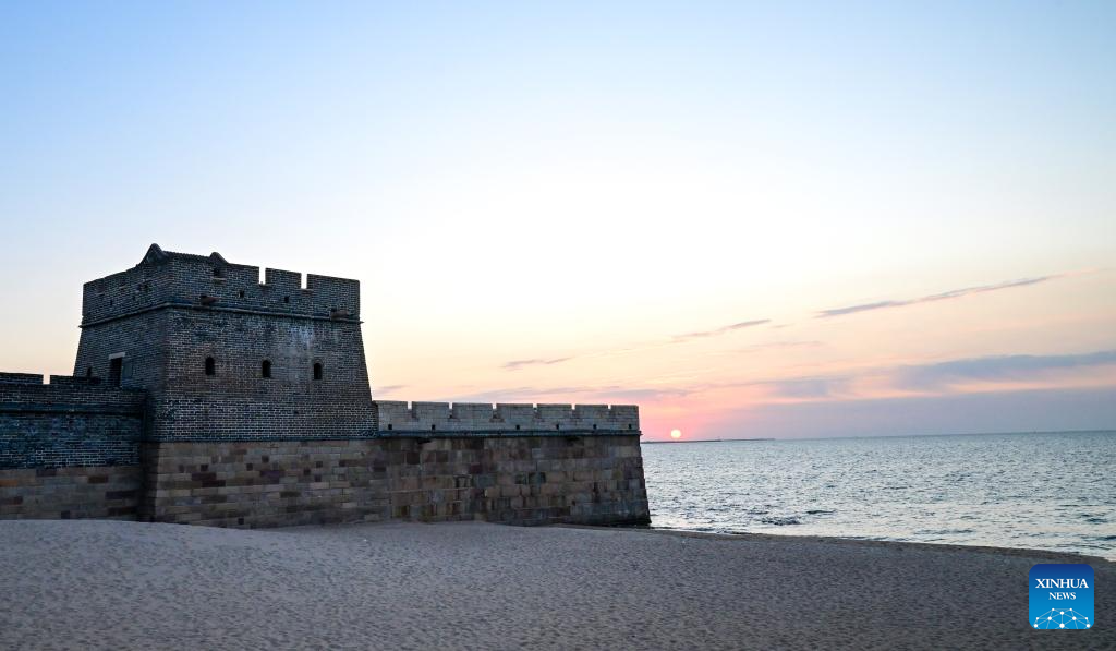 Scenery of sunrise at Laolongtou scenic spot in China's Hebei