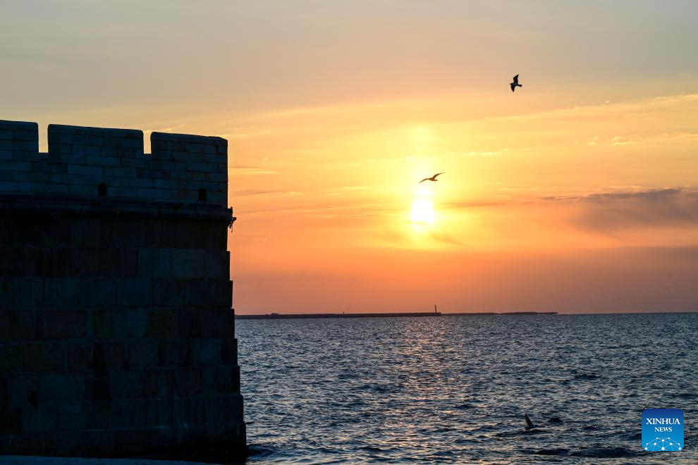 Scenery of sunrise at Laolongtou scenic spot in China's Hebei