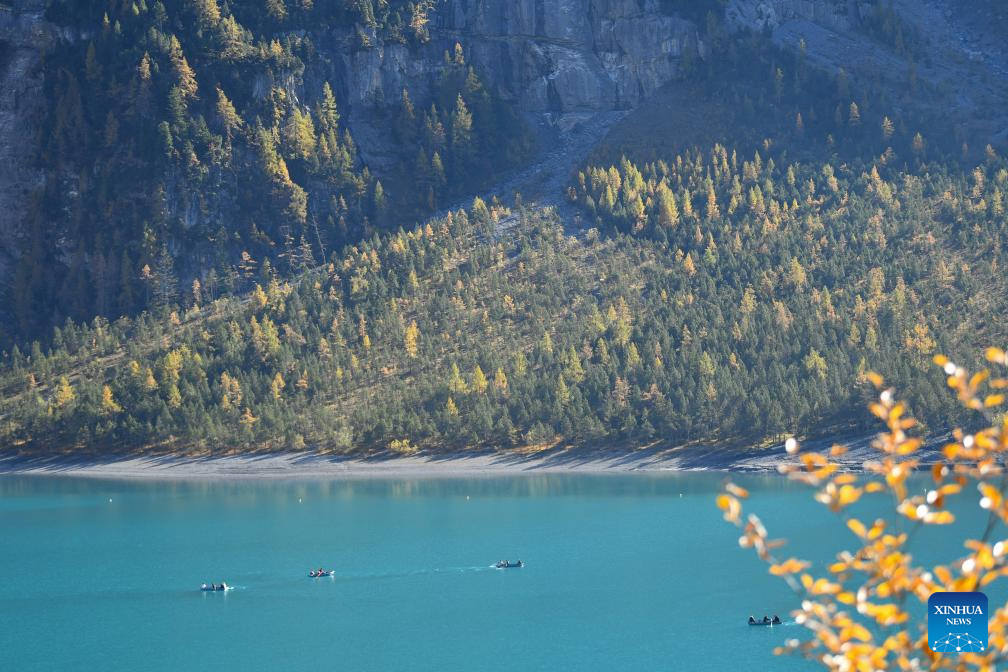 Autumn scenery of Lake Oeschinen in Bernese Oberland, Switzerland