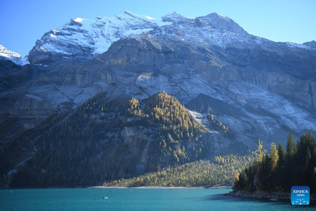 Autumn scenery of Lake Oeschinen in Bernese Oberland, Switzerland