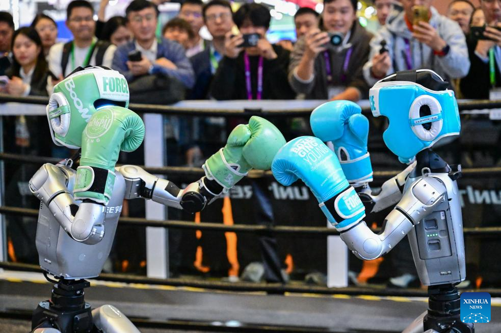 Humanoid robots perform fighting at 8th CIIE in Shanghai