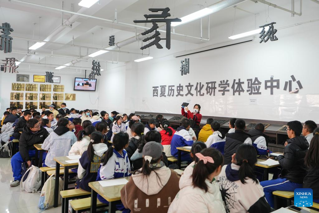 Students engage in cultural heritage education at Xixia Imperial Tombs archaeological site park