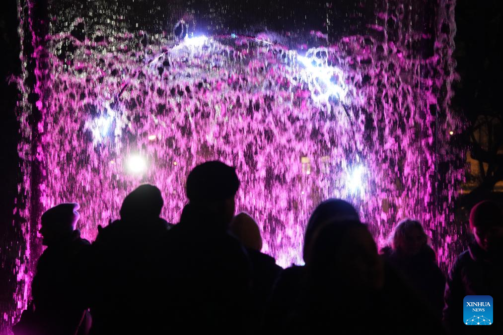 People view light show during light festival 