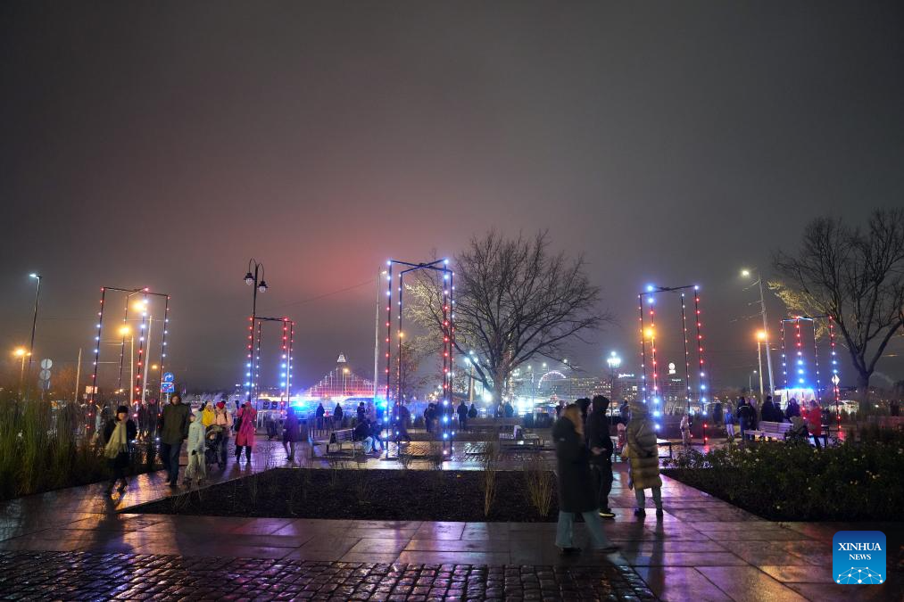 People view light show during light festival 