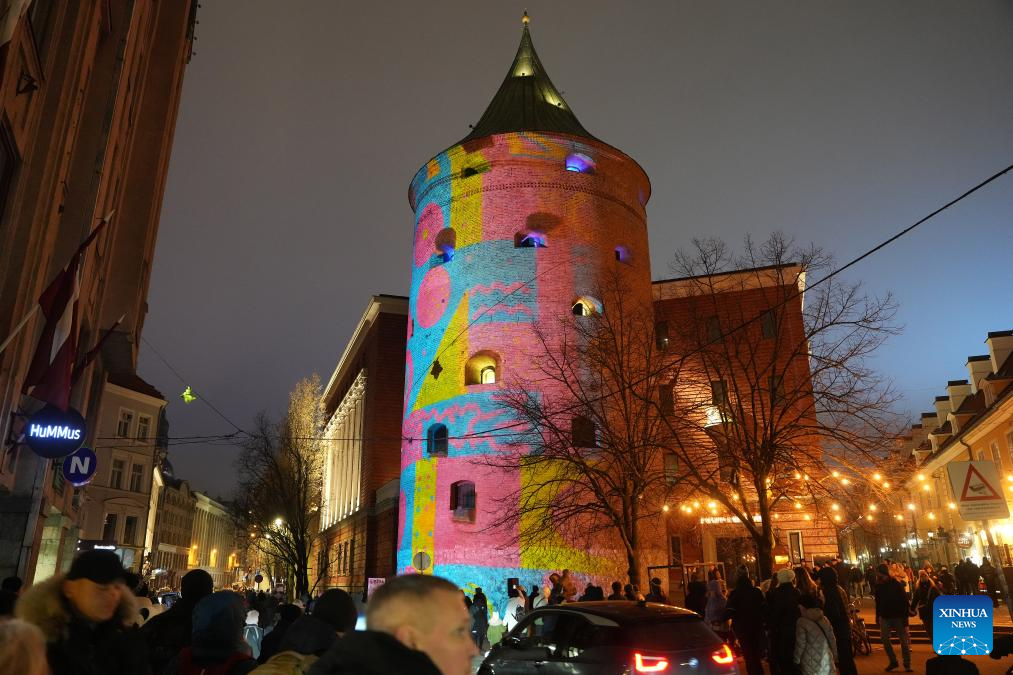 People view light show during light festival 