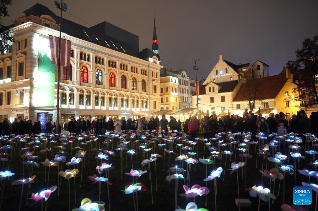 People view light show during light festival 