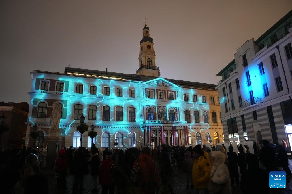 People view light show during light festival 