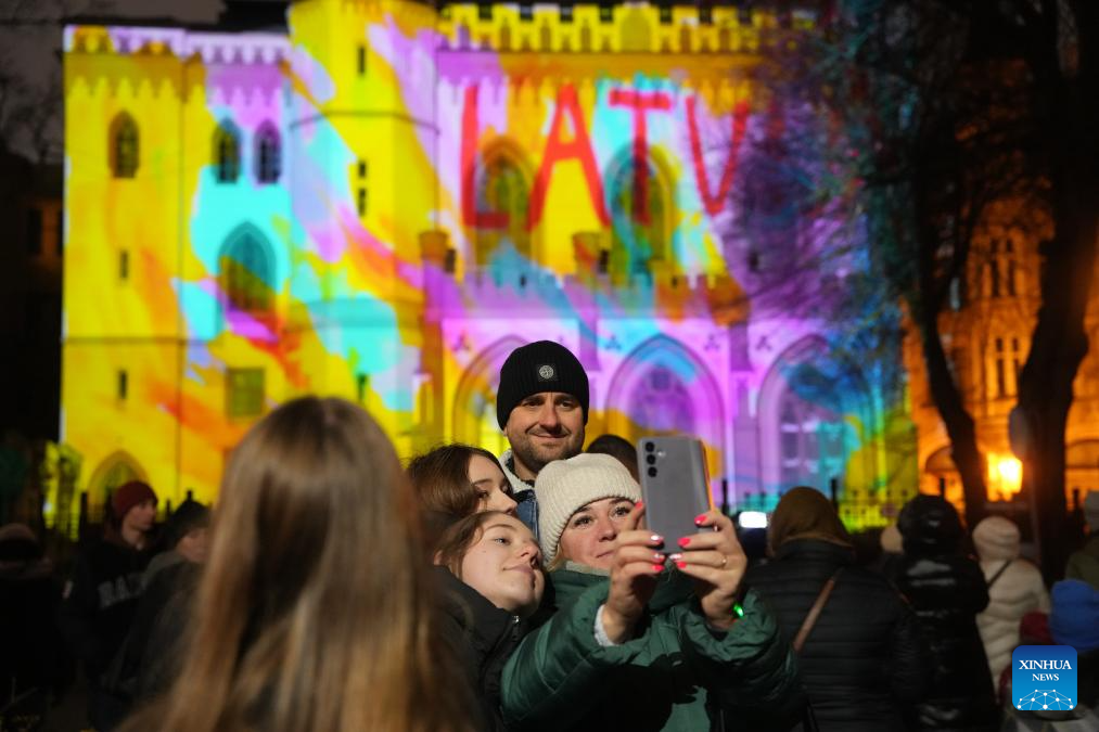 People view light show during light festival 