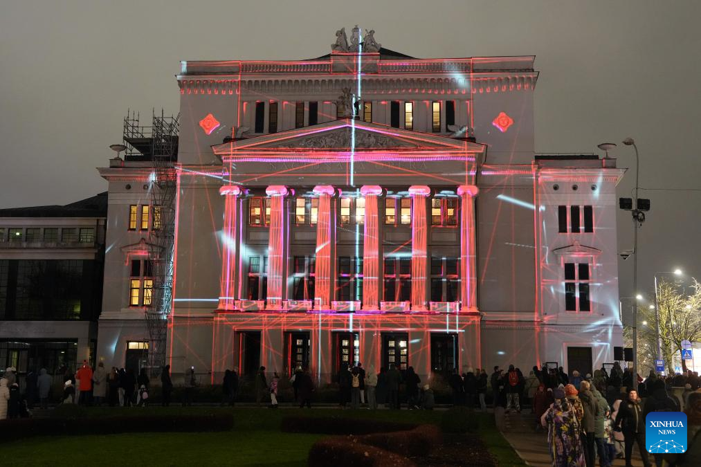 People view light show during light festival 