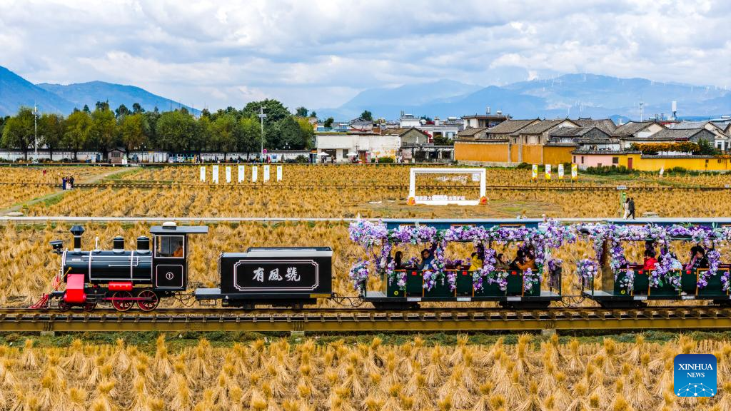 Tourists visit Xizhou old town in Dali City, China's Yunnan