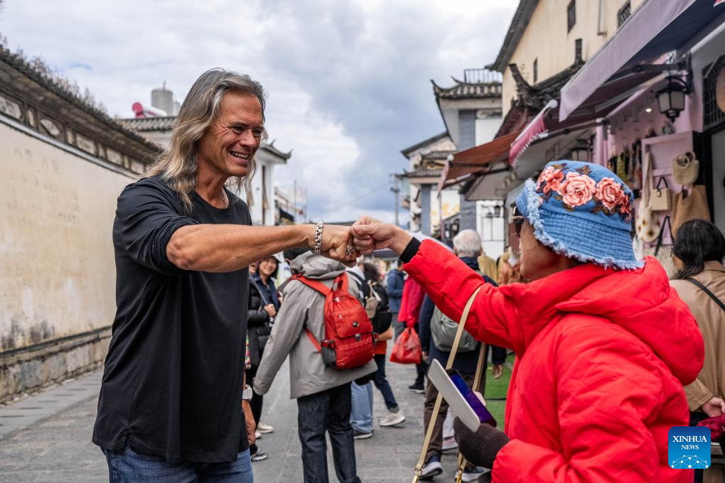 Tourists visit Xizhou old town in Dali City, China's Yunnan