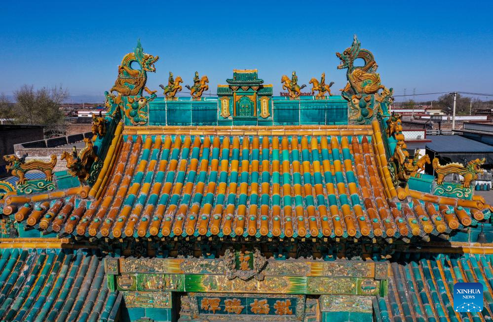 A glimpse of auspicious creatures on rooftops of ancient architecture in China's Shanxi