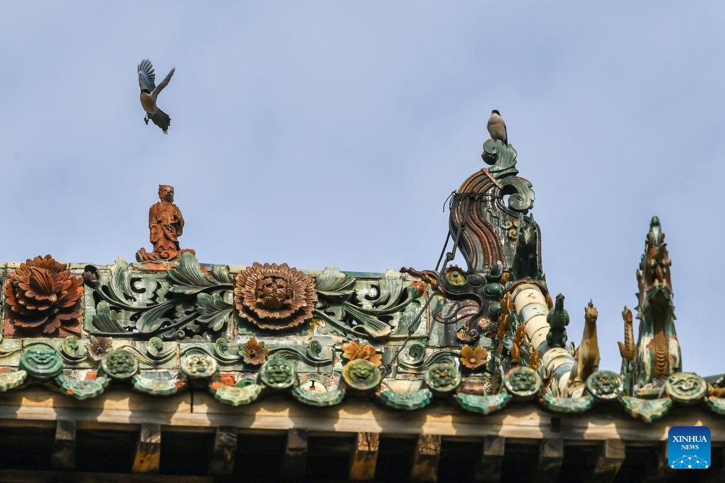 A glimpse of auspicious creatures on rooftops of ancient architecture in China's Shanxi