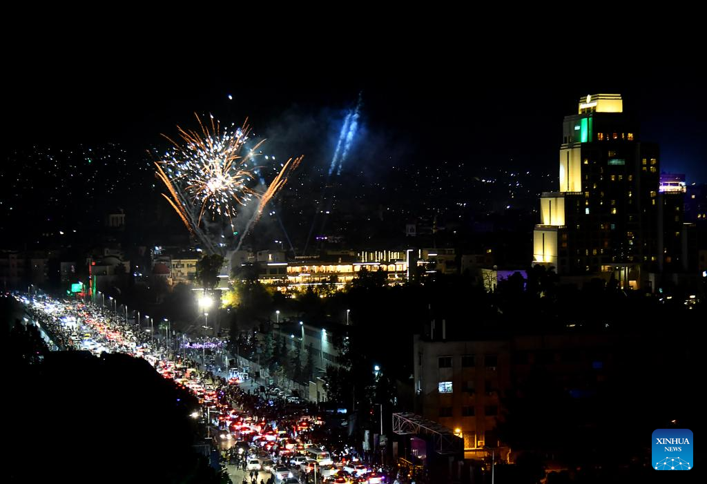 Syria's interim authorities mark first year of political transition with military parade
