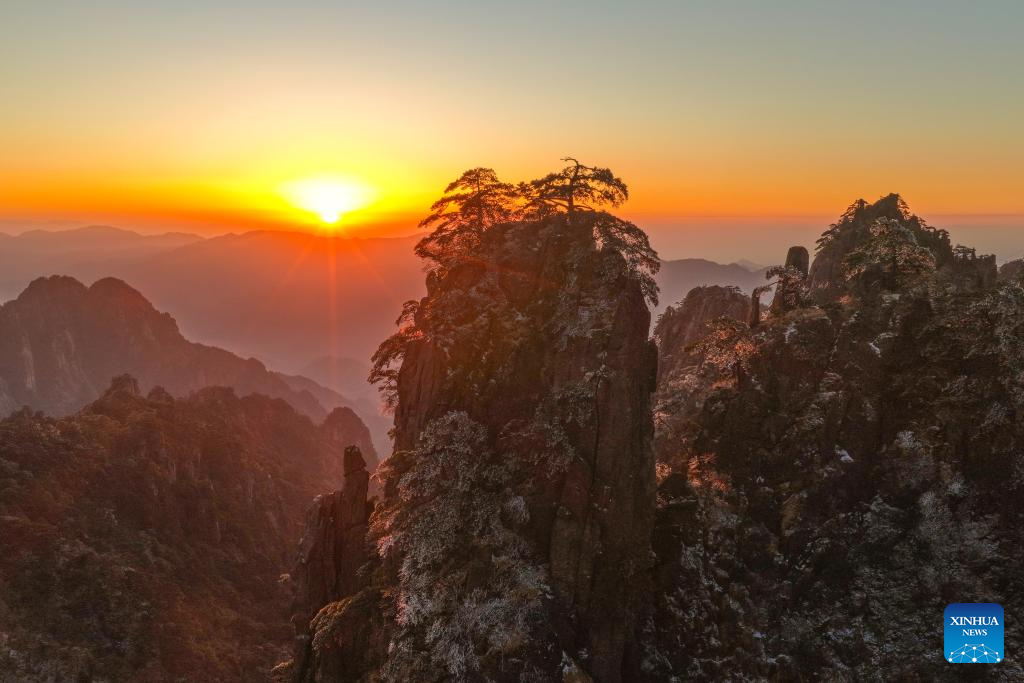 Scenery of Huangshan Mountain scenic area at sunrise after snow in China's Anhui