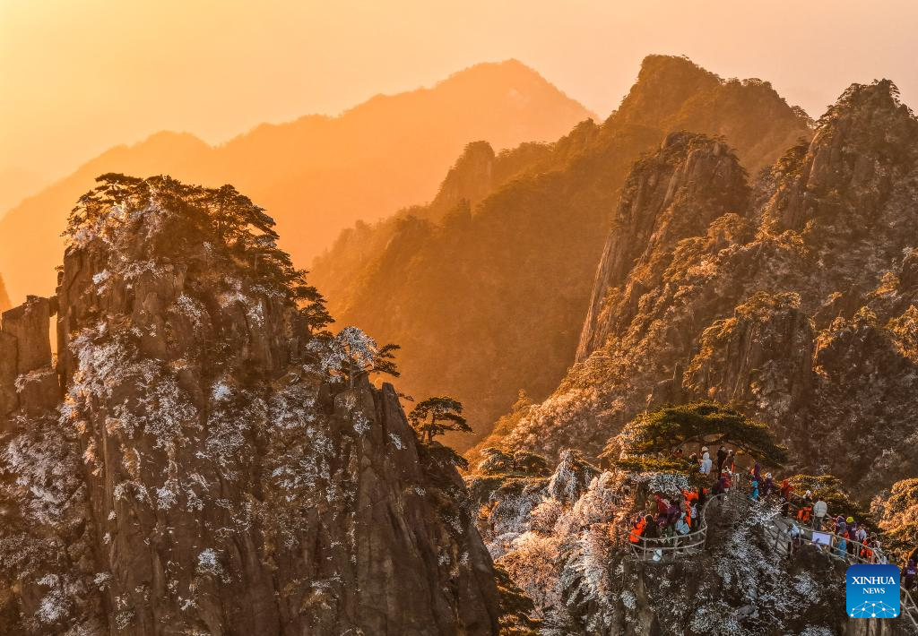 Scenery of Huangshan Mountain scenic area at sunrise after snow in China's Anhui