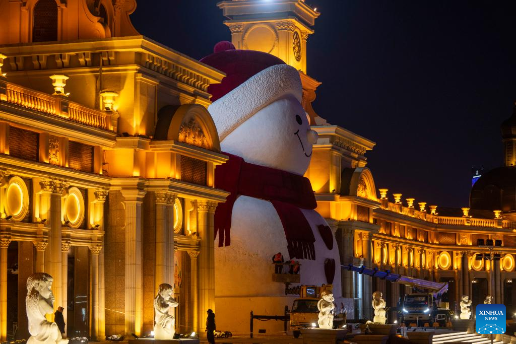 In pics: giant snowman at Qunli music park in Harbin