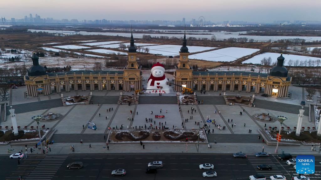 In pics: giant snowman at Qunli music park in Harbin