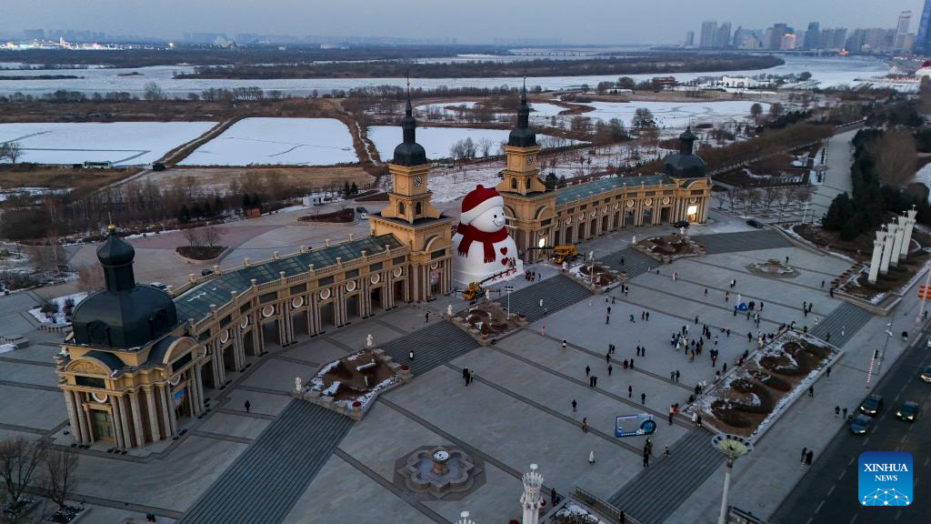 In pics: giant snowman at Qunli music park in Harbin