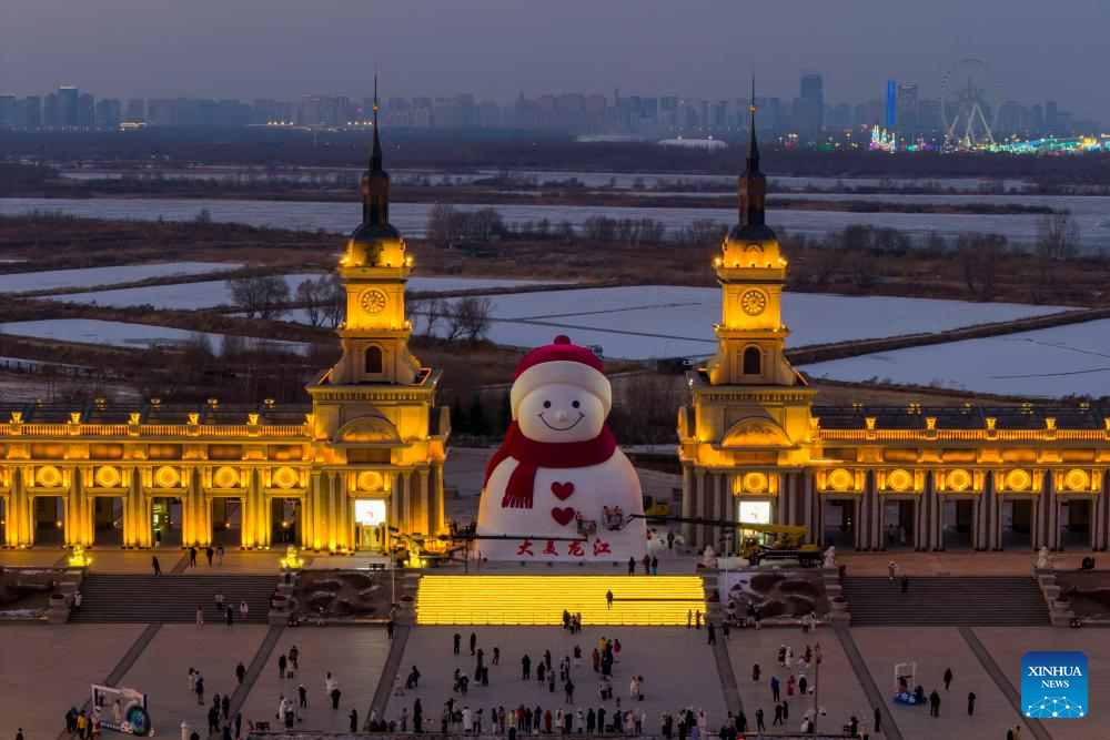 In pics: giant snowman at Qunli music park in Harbin