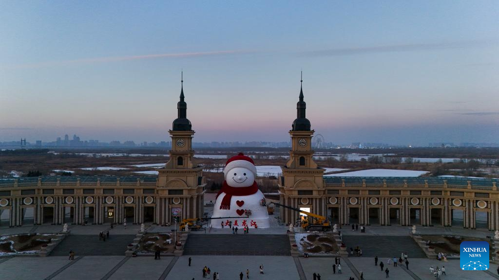 In pics: giant snowman at Qunli music park in Harbin