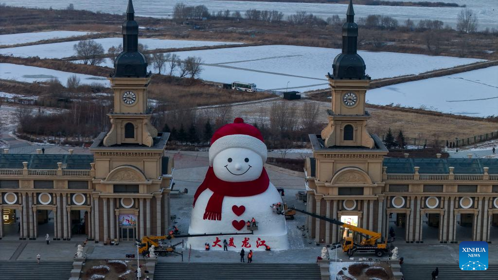 In pics: giant snowman at Qunli music park in Harbin