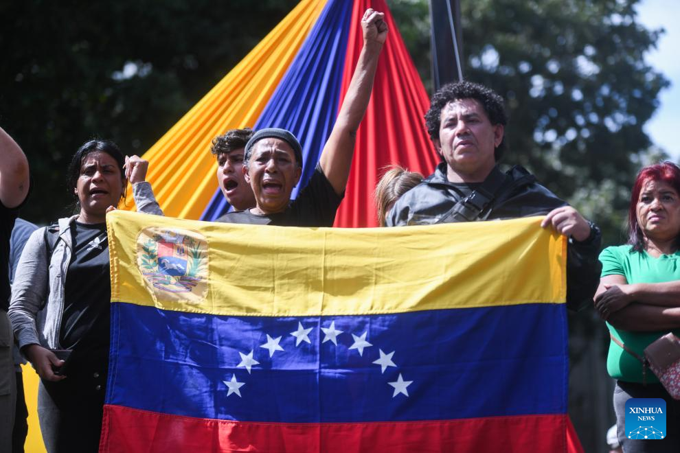 People rally against U.S. attacks in Caracas, Venezuela