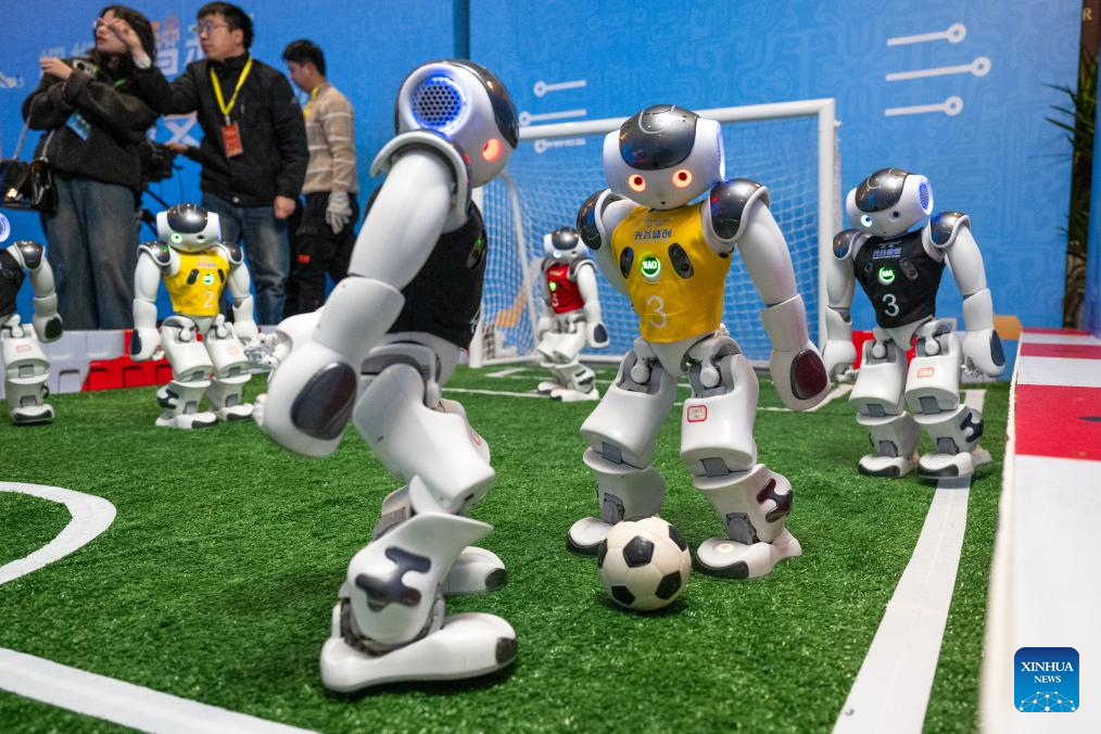 Electric vertical takeoff and landing aircraft, humanoid robots make debut in Wuhan, China's Hubei