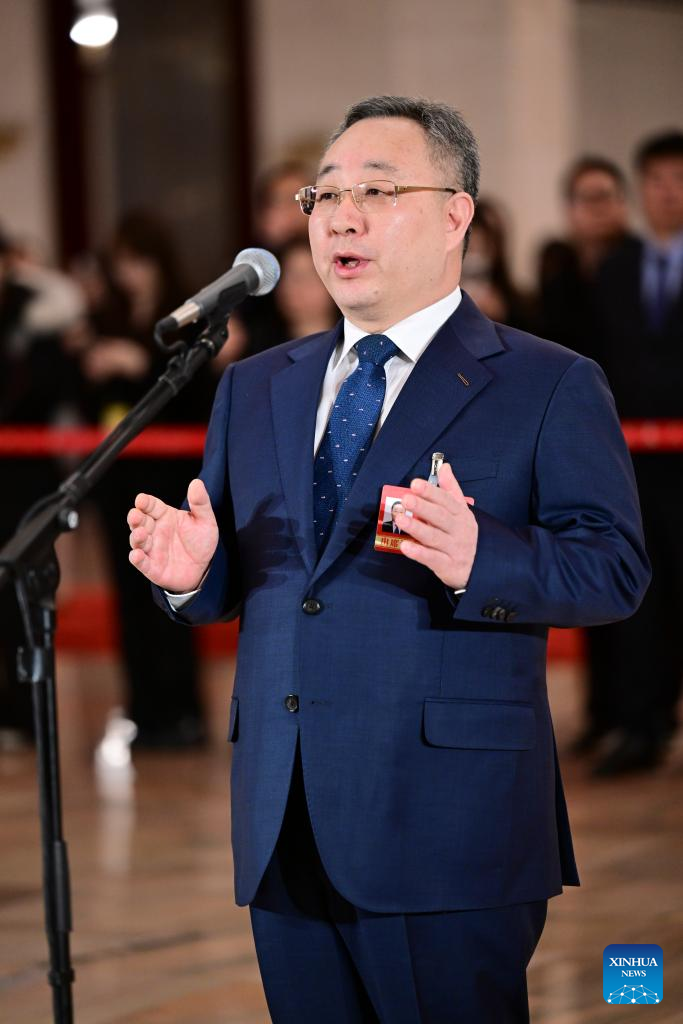 CPPCC members attend group interview ahead of closing meeting of annual session