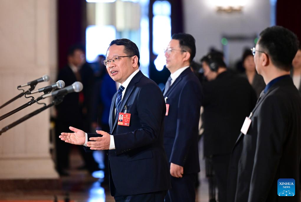CPPCC members attend group interview ahead of closing meeting of annual session