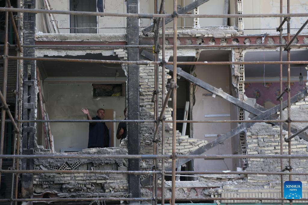 Buildings destroyed in U.S. and Israeli strikes seen in Tehran, Iran