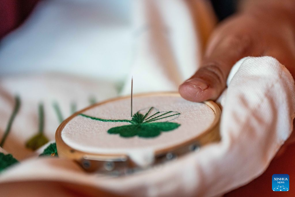 Baisha ancient town in China's Yunnan injects new vitality into embroidery of Naxi ethnic group