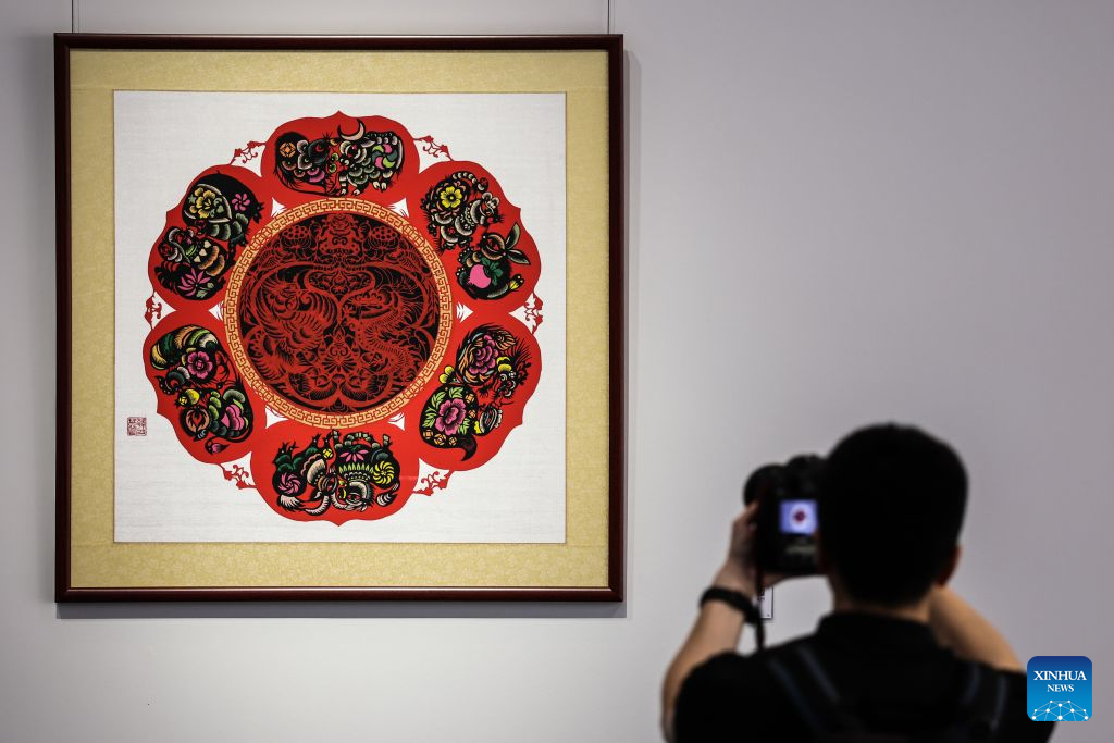 Exhibition of intangible cultural heritage opens to visitors during Summer Davos in China's Dalian