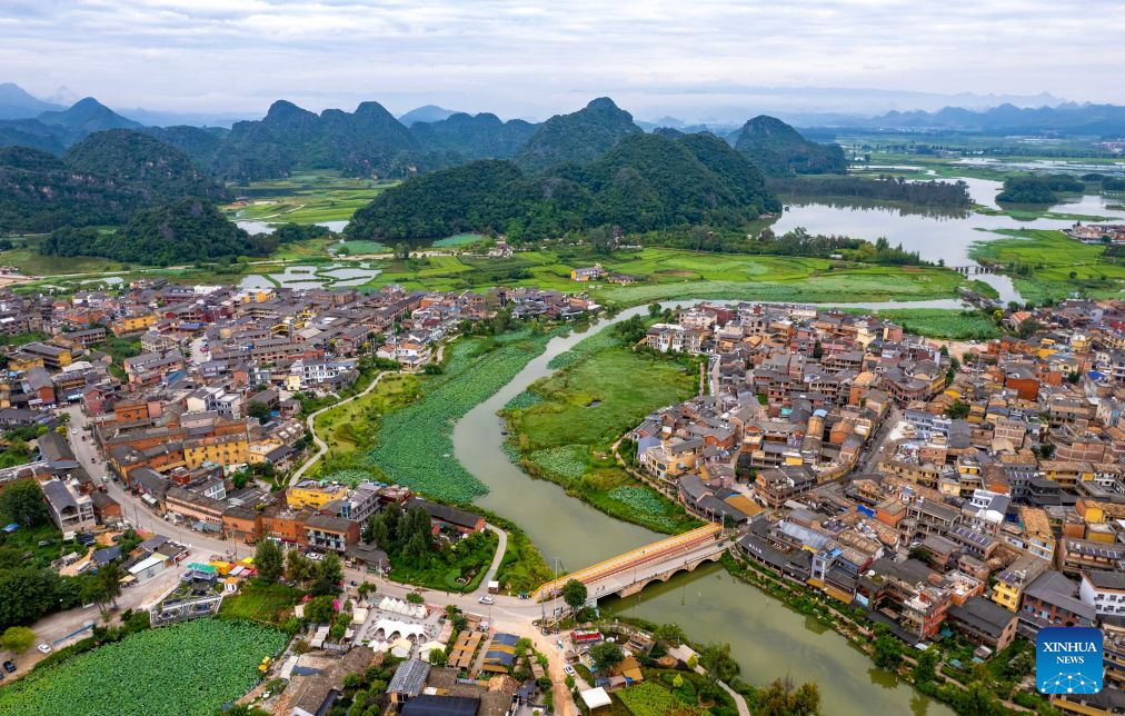 China's Puzhehei scenic area attracts tourists during summer travel season