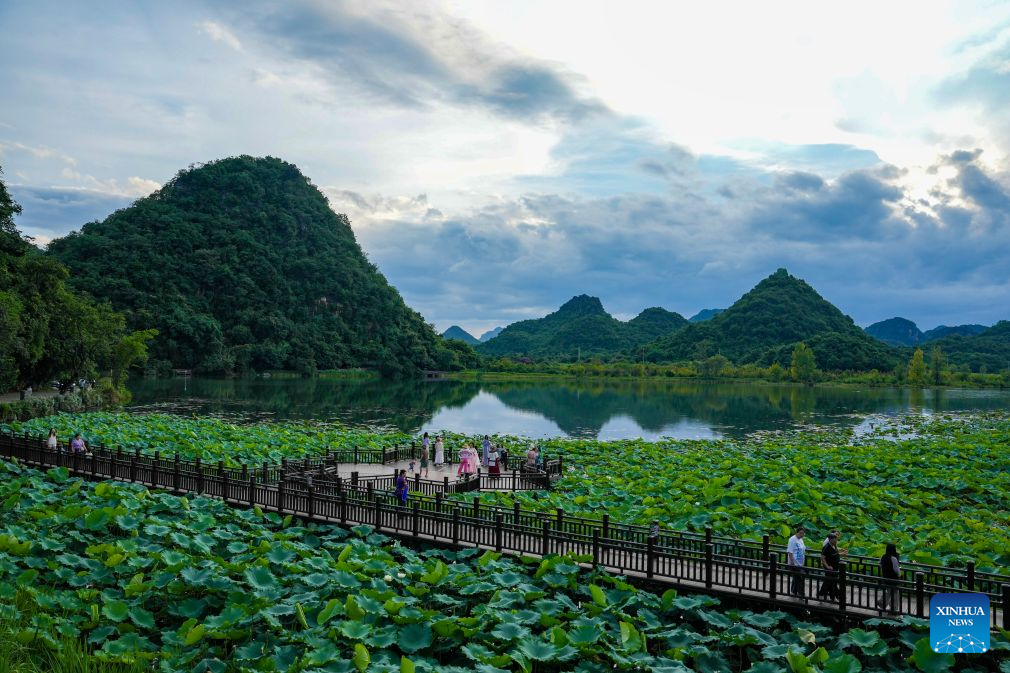 China's Puzhehei scenic area attracts tourists during summer travel season