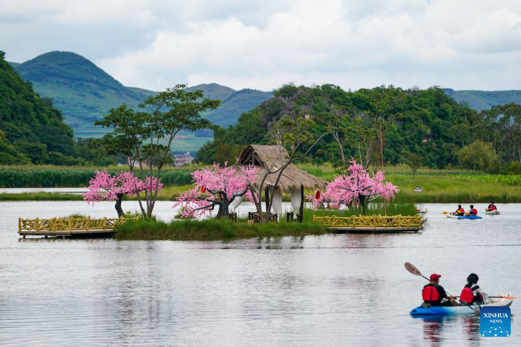 China's Puzhehei scenic area attracts tourists during summer travel season
