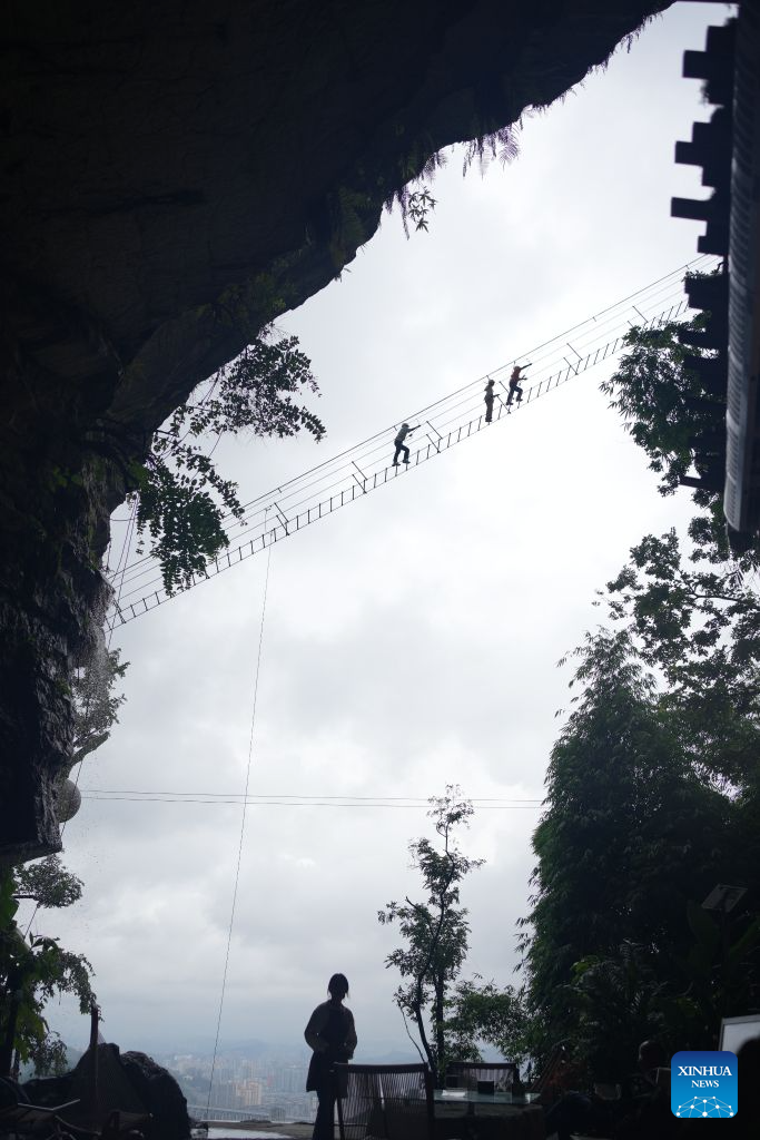 Guizhou's karst caves offer cooling retreats for summer tourists