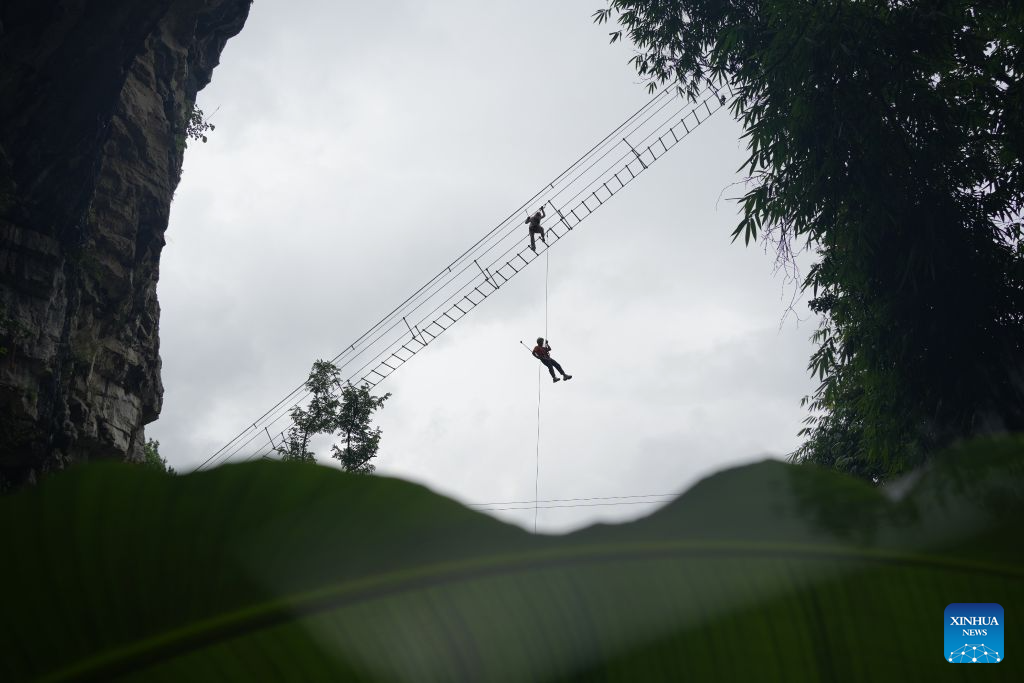Guizhou's karst caves offer cooling retreats for summer tourists