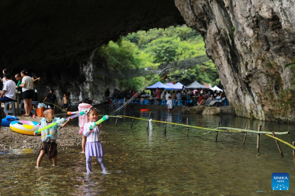 Guizhou's karst caves offer cooling retreats for summer tourists