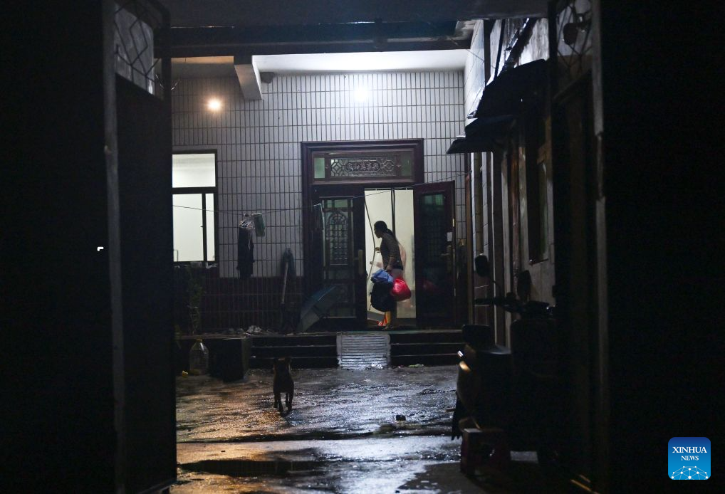 Thousands evacuated as heavy rain swells rivers in central China
