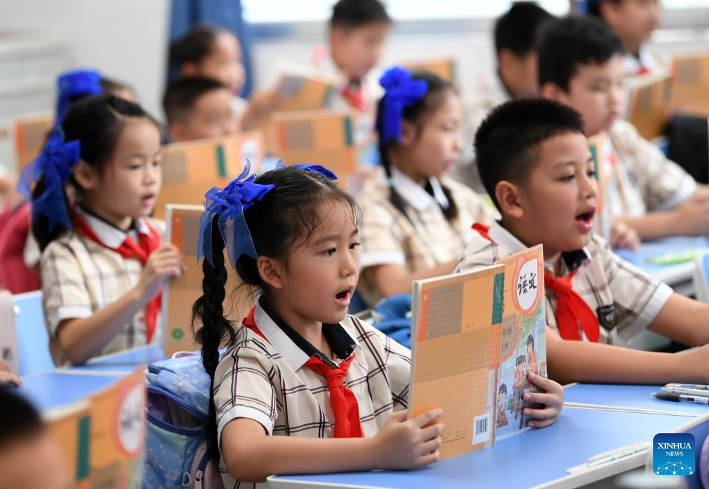 Primary and secondary schools in parts of China welcome first day of new semester